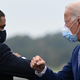 Biden bumps elbows with Rep. Cedric Richmond, who has taken big bucks from the fossil fuel and petrochemical industry.